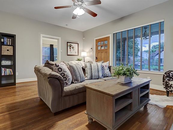 Enter through the front door into the living room.