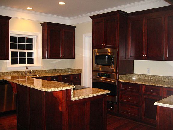 Kitchen Granite counter, breakfast bar, cherry floor