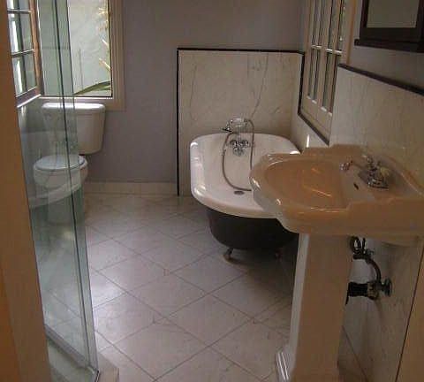 master bath with claw foot bathtub & separate shower