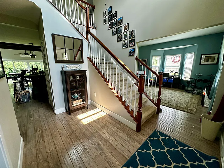 Two Story Foyer with Hardwood floors throughout the main floor.