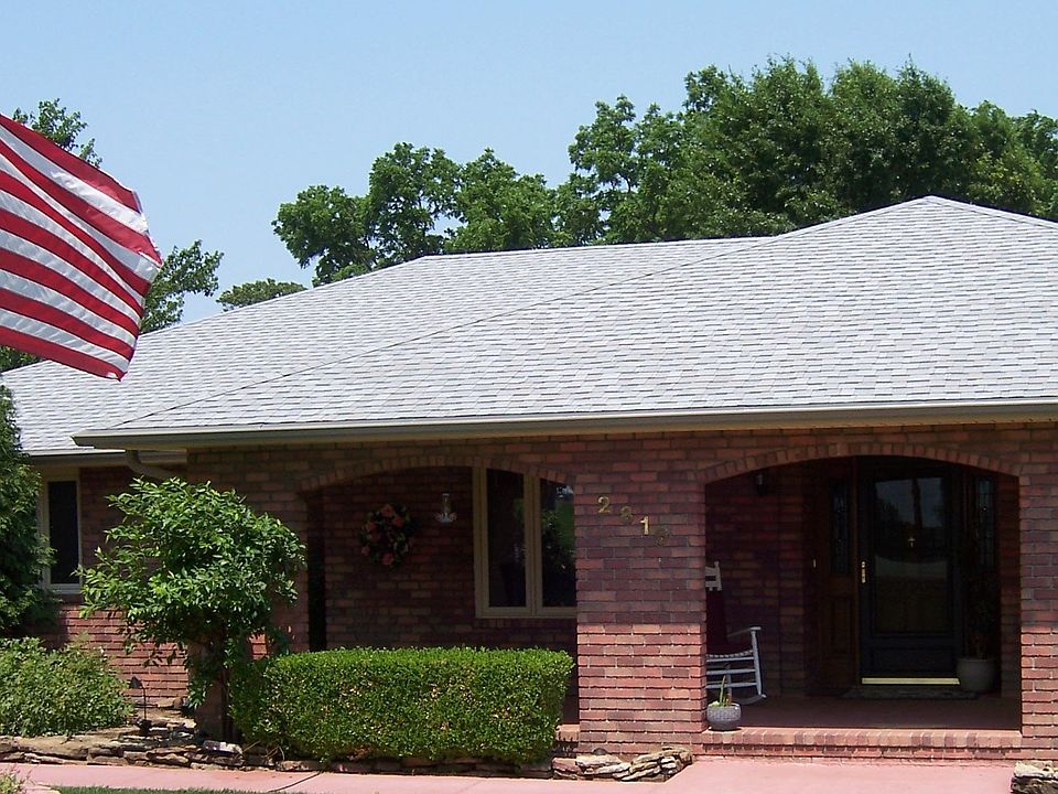Main entry, concrete porch