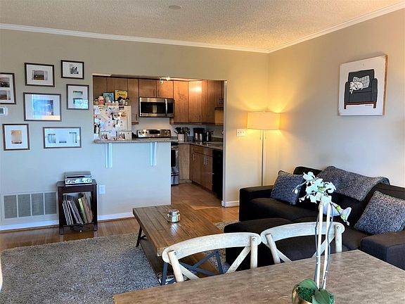 Living Room and Kitchen (from bay window nook)