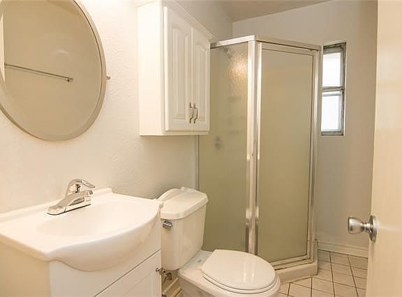 Bathroom. Please note walk in shower. No bathtub.