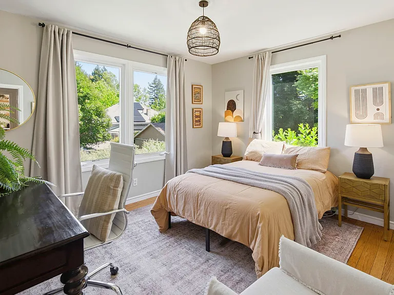 One of the bedrooms on the main floor. The room has a full bed.