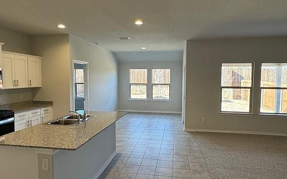 Kitchen - All Home and community information, including pricing, included features, terms, availability and amenities, are subject to change at any time without notice or obligation. All Drawings, pictures, photographs, video, square footages, floor plans, elevations, features, colors and sizes are approximate for illustration purposes only and will vary from the homes as built.
