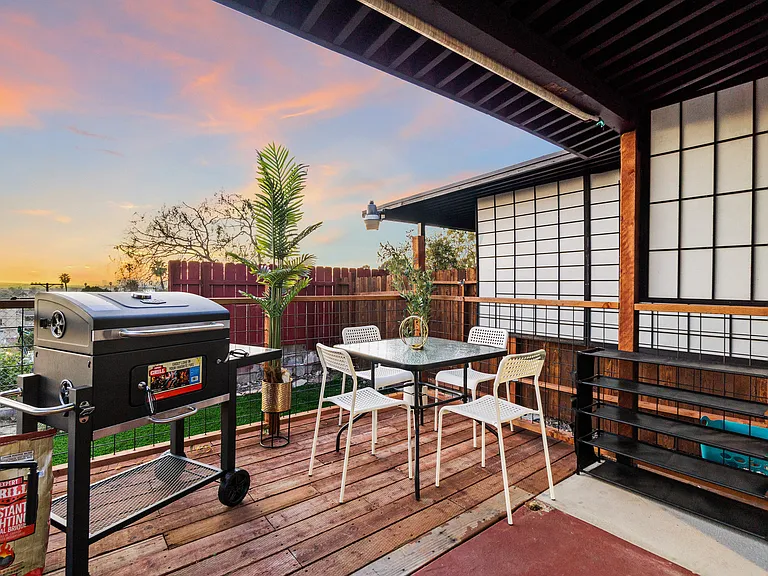 This spacious outdoor lounge is perfect for sunny get-togethers or evening BBQs