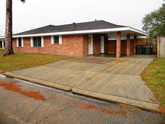 SINGLE-CAR CARPORT WITH STORAGE ROOM -- 1,563 SQ. FT. -- LIVING