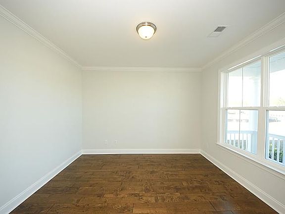 Photos are of a similar home