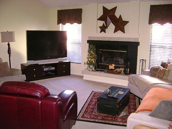 Woodburning fireplace in Family Room.