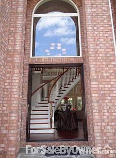 Front Doors
						:
						Open to floating curved staircase