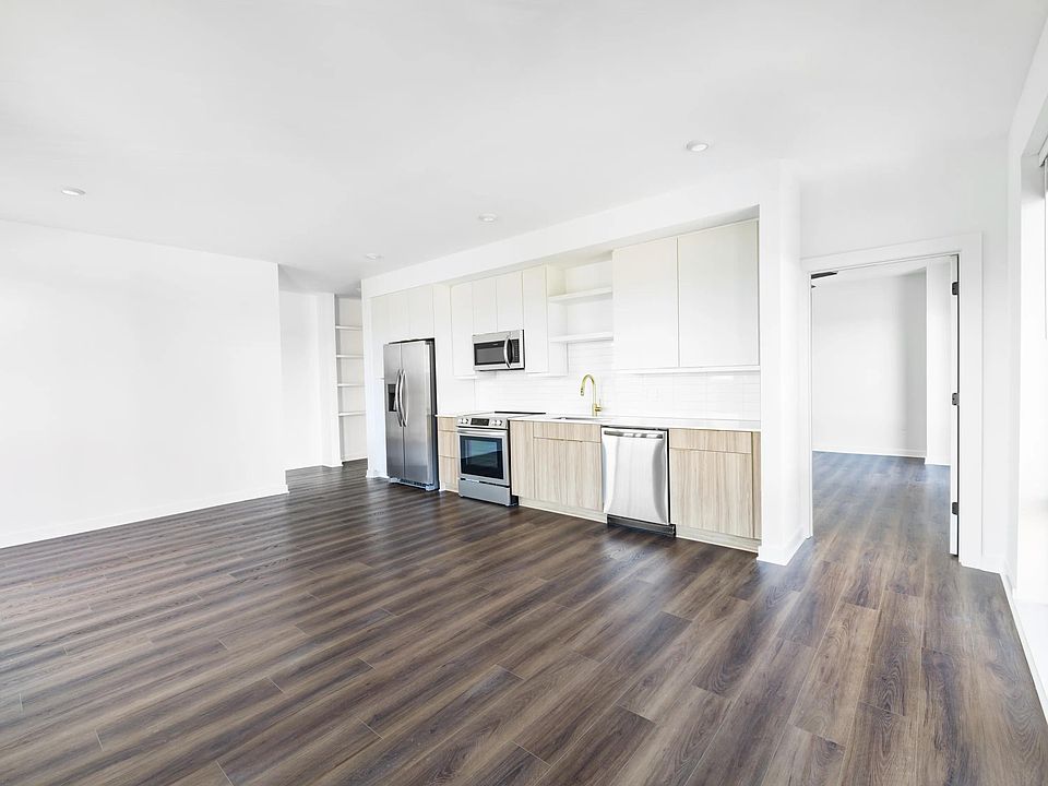 An open, light-filled kitchen anchors this Nashville home at Modera Nations, with clean lines, refined finishes, and space designed for effortless everyday living.