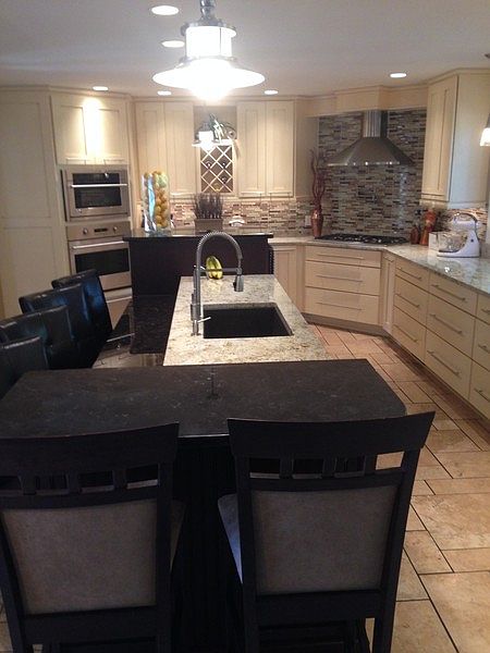 State of the Art Newly Renovated Kitchen
						:
						Island seats 6, elevated dishwasher, lots of storage & counter space