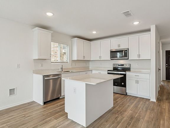 Abundant cabinet space in kitchen