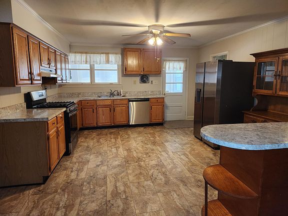 Kitchen. New flooring, new counters, new sink, faucet, disposal, new appliances, new paint/trim.