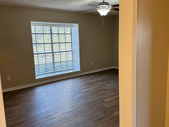 Living room view from hallway with window , which provides lots of natural lighting.