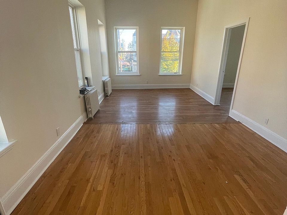 View of the dining area and living room from the kitchen
