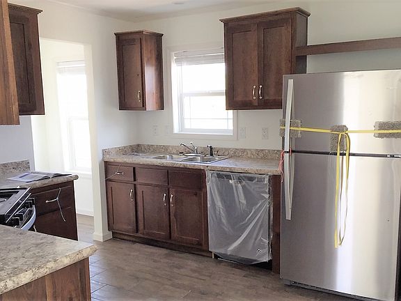 Hardwood Walnut Cabinets - Stainless Steel Appliances
