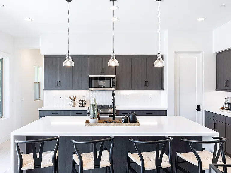Bar-height seating for four is available on the kitchen island.