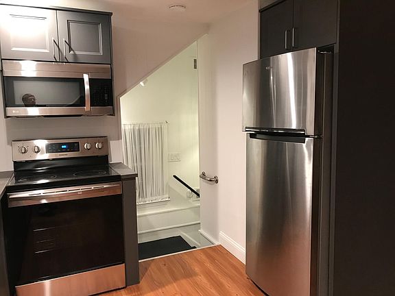 View of kitchen and entry