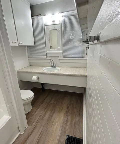 Has storage and lots of counter space. Windows on both side of mirror.
NOTE: there is no air vent/fan (100 year old home)