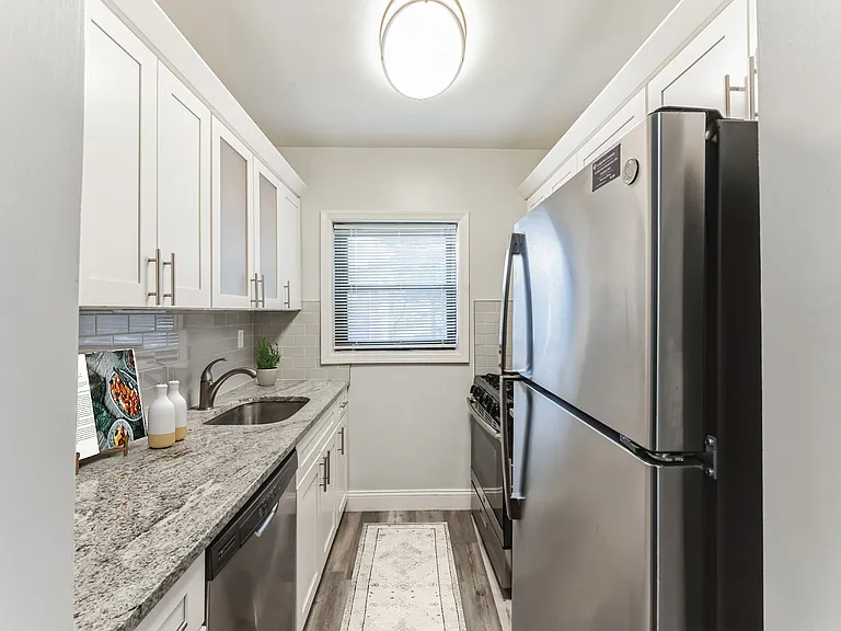 Elevate your lifestyle at Eagle Rock Apartments at Hicksville. This sleek kitchen features modern finishes, stainless steel appliances, and ample counter space, perfect for culinary adventures. Schedule your visit today to see more!