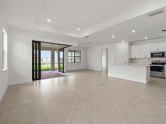 Open-concept gathering room, kitchen, cafe, zero-corner sliding glass door