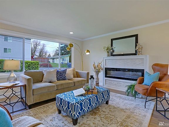 Corner lot home with Lots of upgrades including brand new fireplace and hot water tank. 