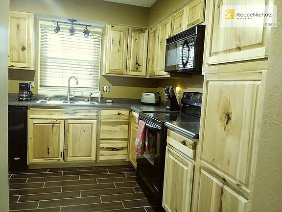 REMODELED KIT WITH GRANITE COUNTER TOPS AND NEW APPLIANCES