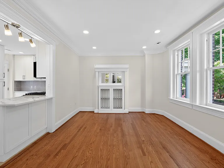 Dinning room featuring original 19th century mantle piece.