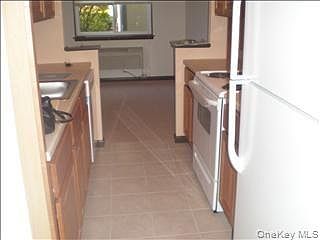 3rd image of 15 Club House Dr Unit 2F
