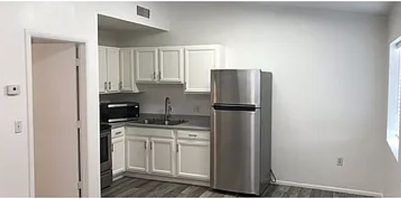 Kitchen with white shaker cabinets