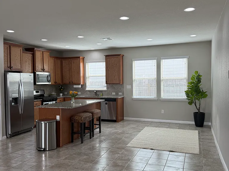 New Hardware- All appliances included~ Stainless appliances LARGE CABINETS...lots drawers in island too!