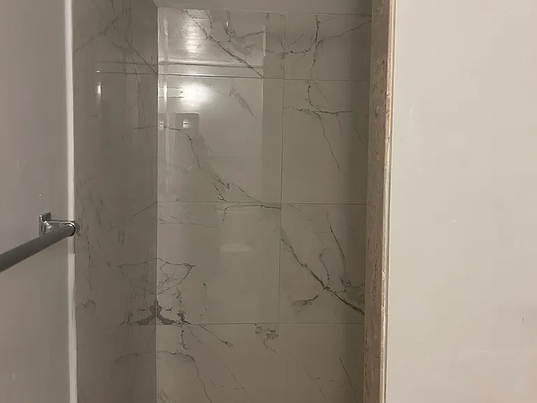 full private bathroom in the room with shower