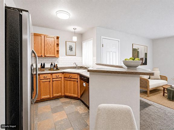 5th image of 10734 W 63rd Place #104