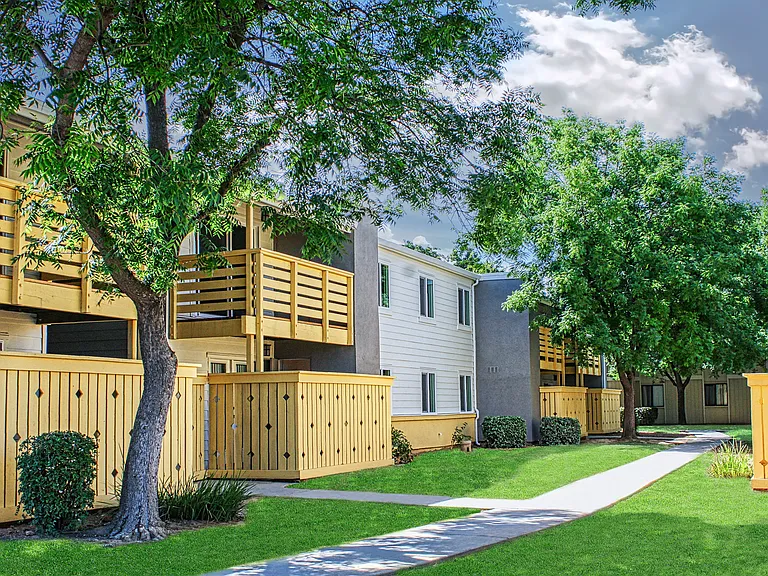 Peaceful tree-lined walkways and lush greenery.
