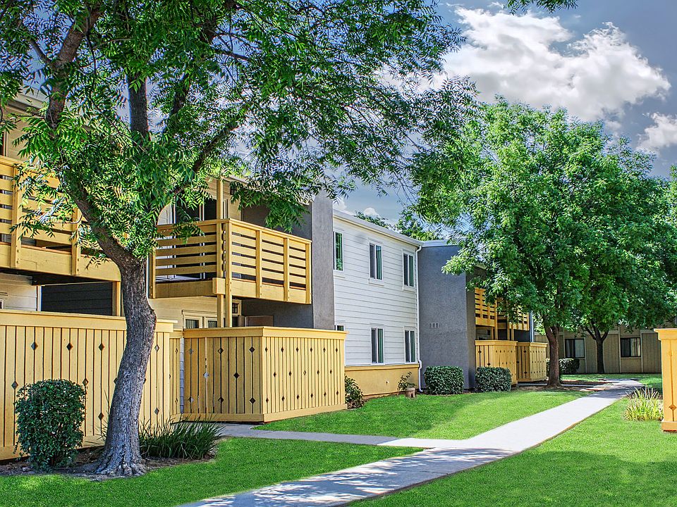 Peaceful tree-lined walkways and lush greenery.