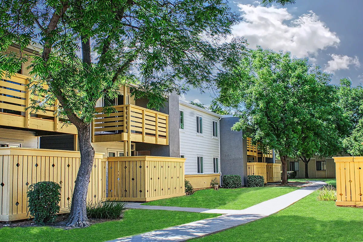 Peaceful tree-lined walkways and lush greenery. - 1275 S Winery Ave