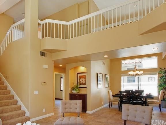 Dramatic vaulted ceilings in the living room and dining room.