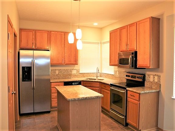4th image of 409 Flat River St