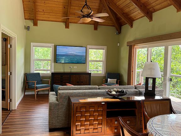 Kitchen View of the Family Room and Dining Area.