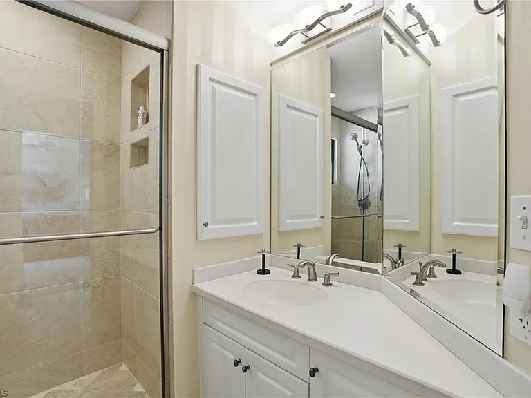 7048 Pelican Bay Blvd #C-302 — Photo 27
