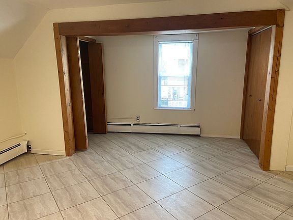 LR with double closets and tile flooring