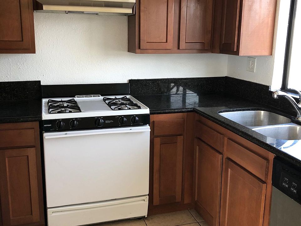 New Kitchen cabinets, pull-out faucet, vent hood. Gas stove, dishwasher, comes with refrigerator.