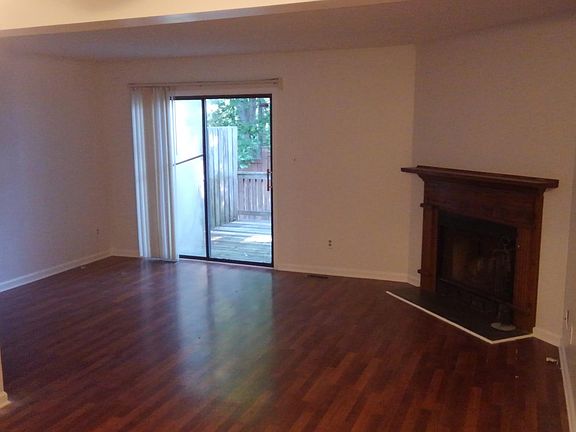 Living room with wood burning fireplace