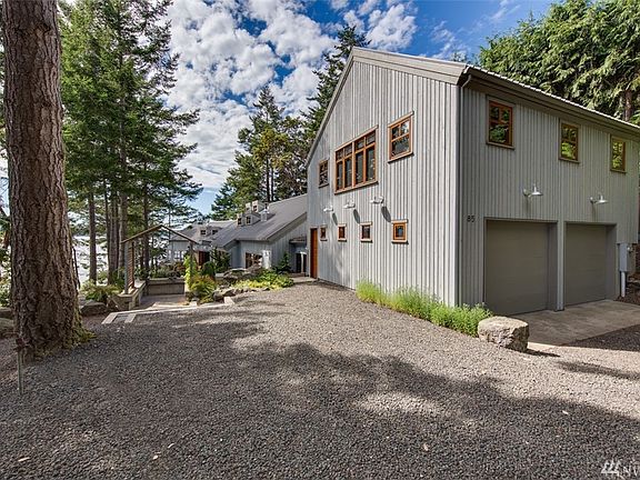 The guest wing is located above the oversized 2-car garage.  It is connected to the main home through the atrium entry.  