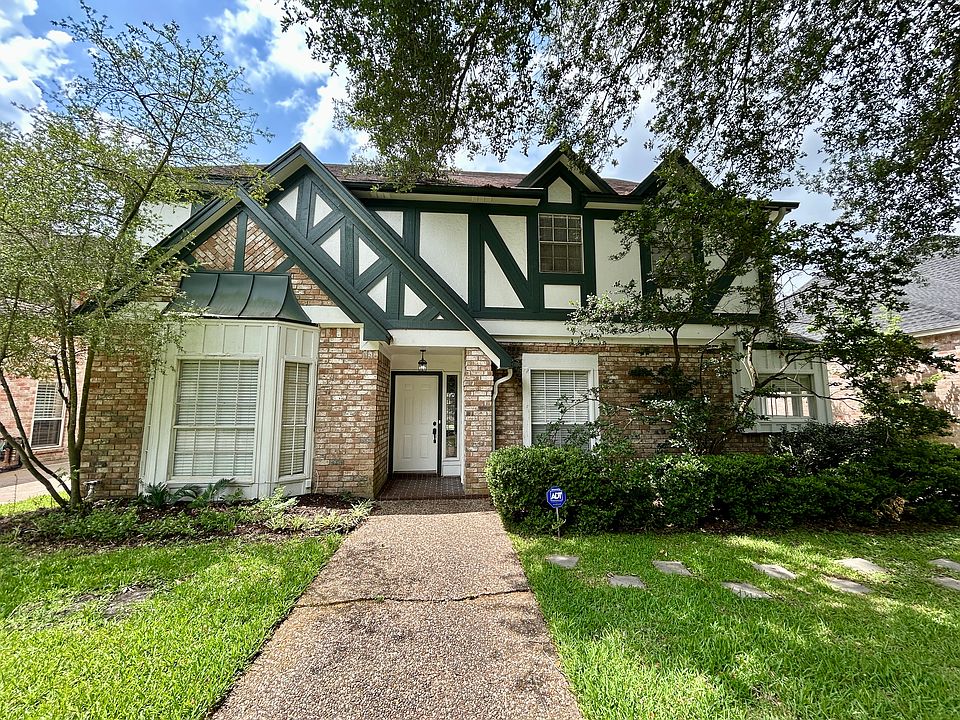Spacious 4 bedroom, 2-1/2 bath home with primary bedroom downstairs.