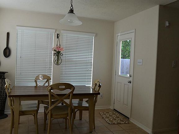 Breakfast room with lots of windows for natural light.