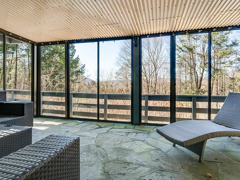 The screen porch.
