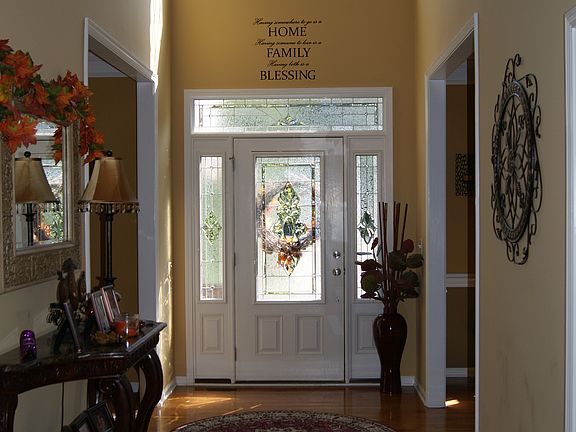 view of door and foyer