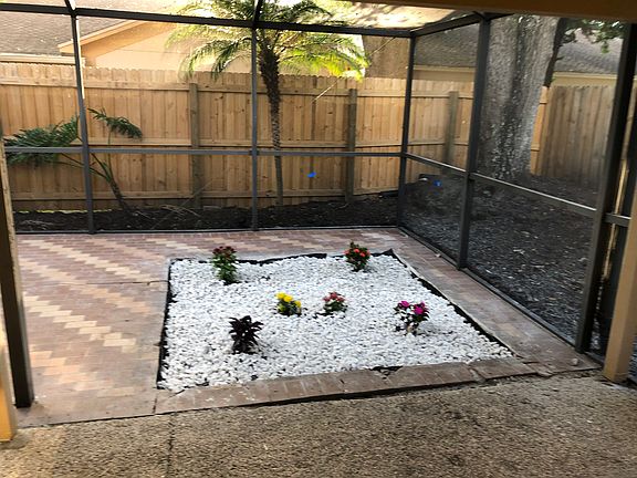 Screened in back porch.